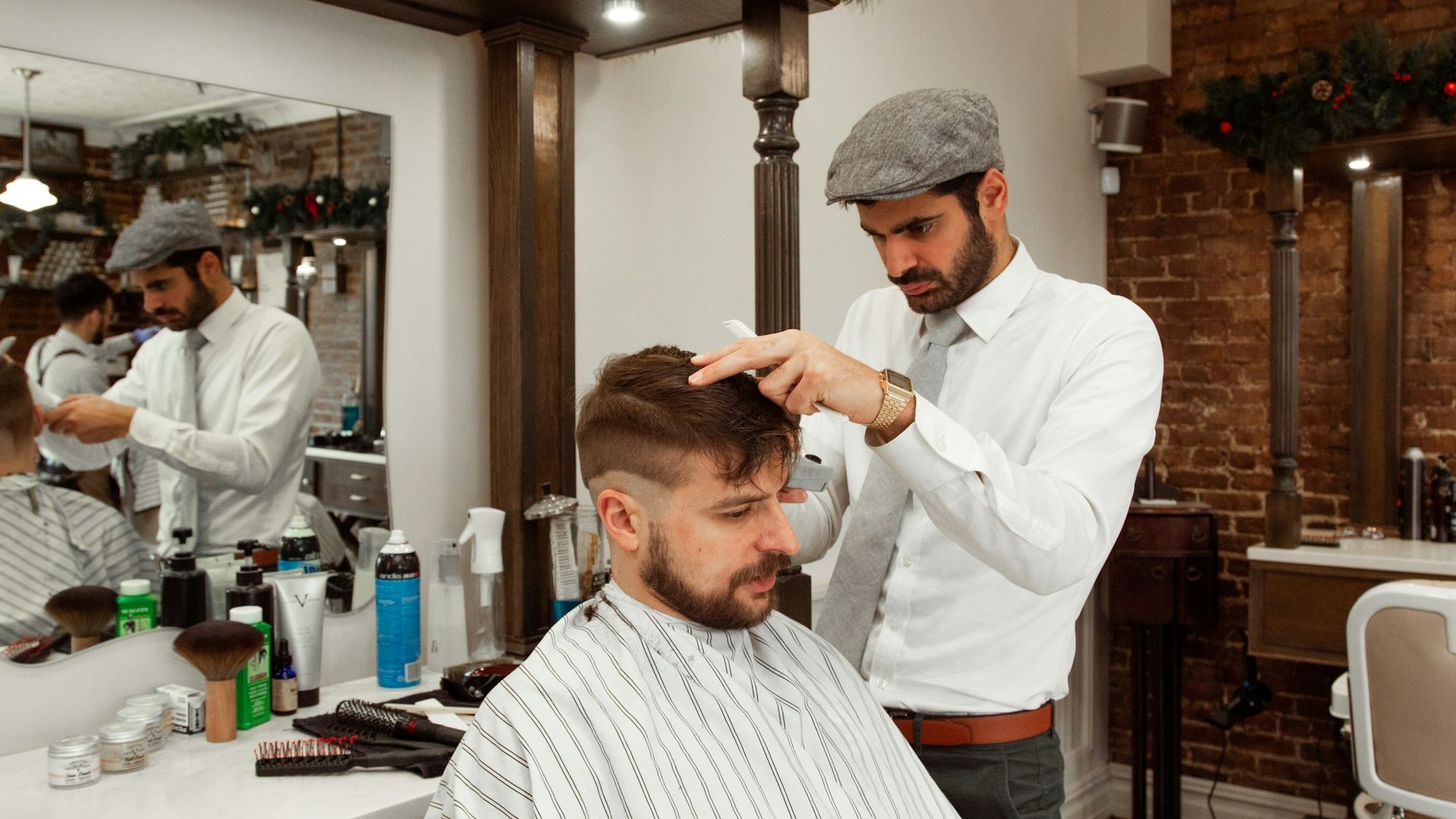 Barber finishing a skin fade